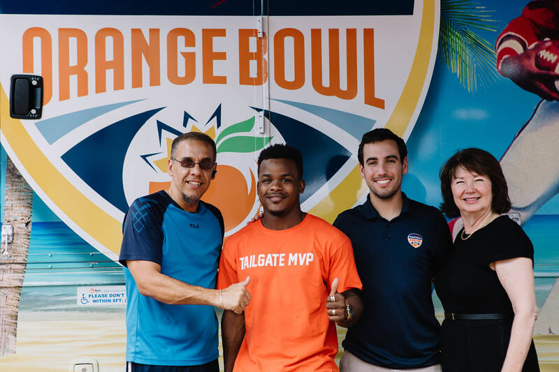 Guests in front of the Orange Bowl truck