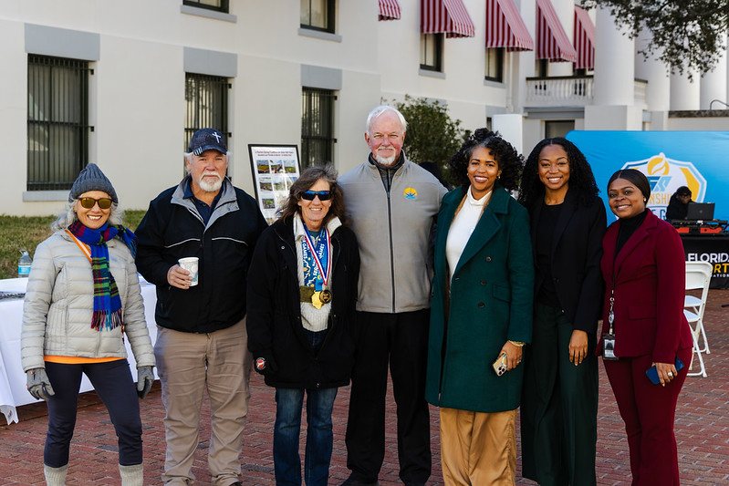 Guests and athletes outside the Historic Capitol