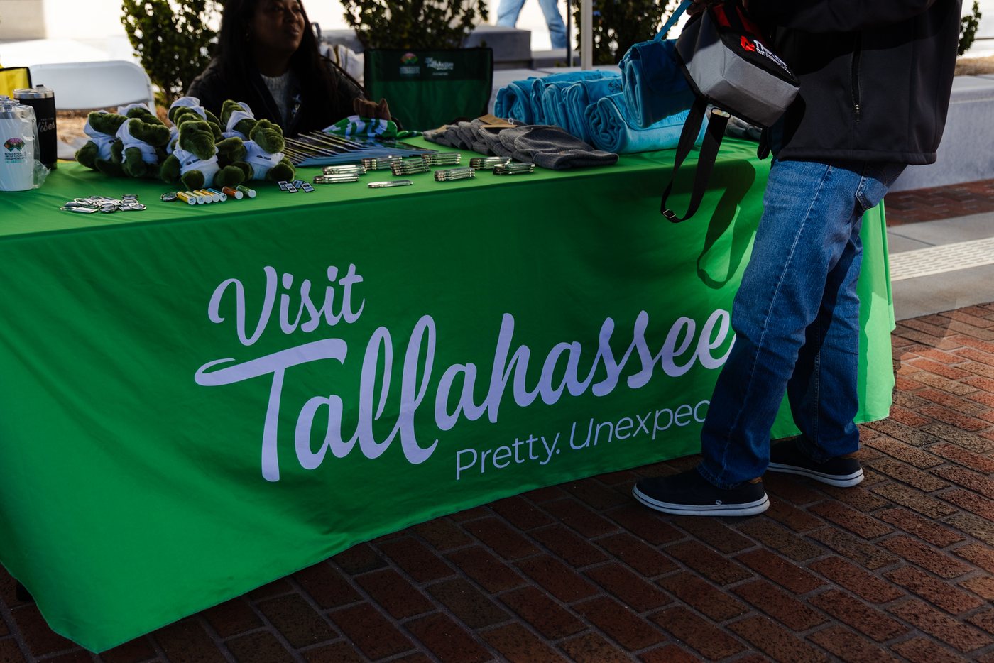 Visit Tallahassee display table with giveaways